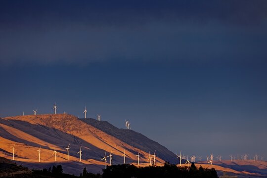 Windmills at sunset.