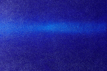 On a blue gradient background in fine grain, a gradient light blue horizontal beam of light
