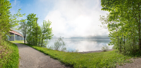 view from lake shore to bridge over lake Sylvenstein, upper bavaria