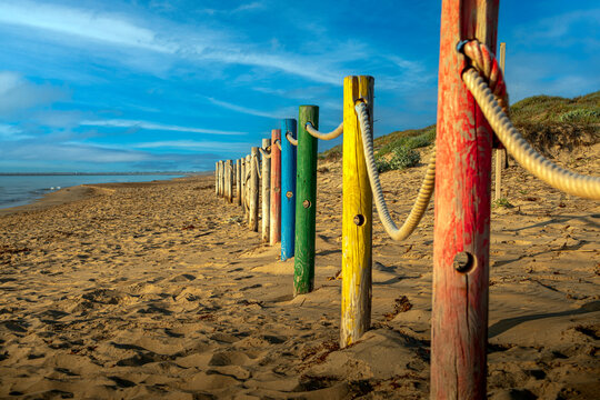 Gay area of ​​El Rebollo beach in Elche, Alicante, Spain. The fence has the colors of the gay or rainbow flag