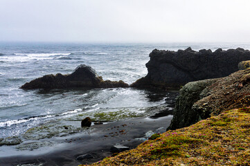 waves crashing on rocks