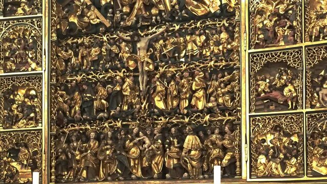 The altarpiece, representing the passion of Christ, in 23 carat gold leaf in the Cathedral of San Canuto in Odense. Odense, Fyn, Denmark, Europe