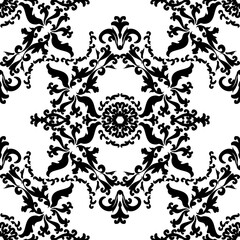 Vector vintage wallpaper in damask style. Seamless floral pattern. Black and white ornament of scrolls and flowers.