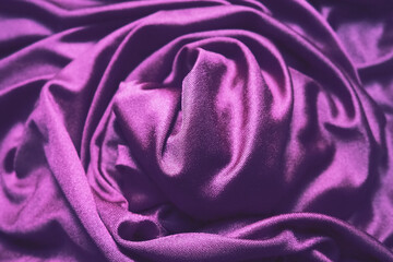 Velour fabric, similar to silk. Textiles in a folds, beautiful waves, twisted into a circle....
