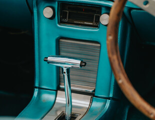 Interior of a 1966 Ford Mustang. Automatic transmission selector. The Ford Mustang is a car...