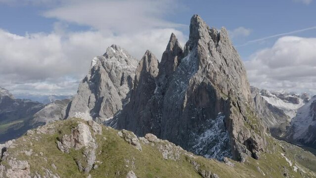 flying above geisler dolomites mountains on sunny day
