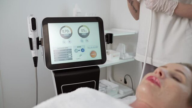 Laser Elos medical device. Cosmetology spa procedure in the salon. Depilation equipment. Procedure rf-lifting. Skin rejuvenation device.