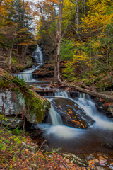 waterfall in autumn forest