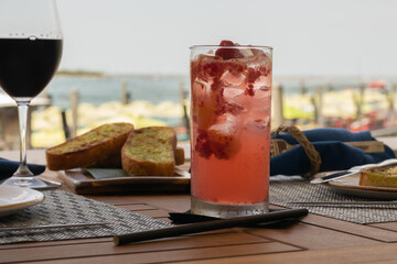 tropical drink in a dinner setting with blurred background