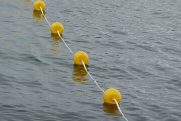 Line of yellow buoys