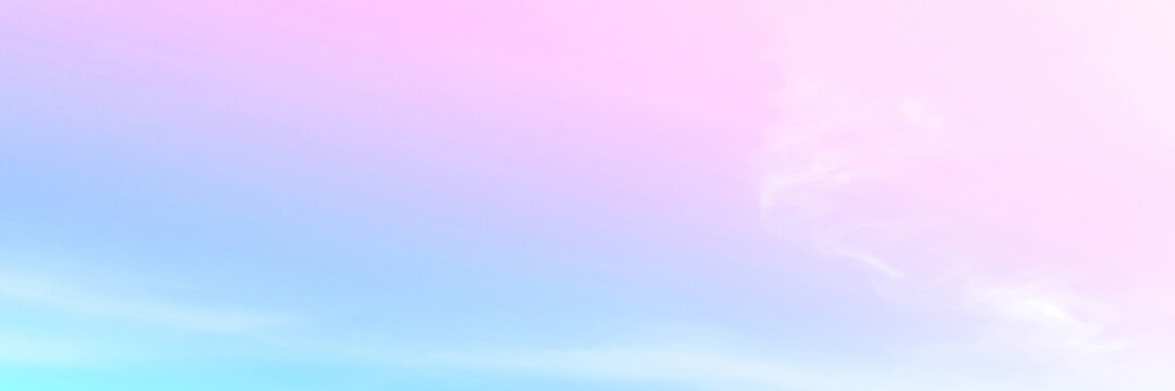 Pastel sky with soft white clouds. Fantastic color fantasy background. Sweet dreams concept for wallpaper, backdrop and design.