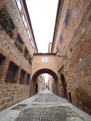 Old narrow street in european city. Plasencia, Spain, comunidad autonoma de Caceres.