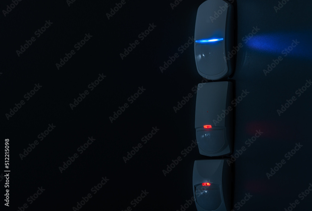 Poster modern motion sensors in action in a dark room.