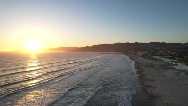Aerial 4k video of Pismo Beach in Central California at sunset