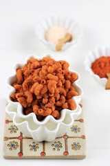 Spicy Crispy Macaroni, Popular Snack in Bandung, Indonesia. Made from Fried Macaroni with Spicy Spice Powder. Known as Makaroni Ngehe