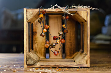 Decorative decoration. Beads from amber. Brown colors, ancient resin