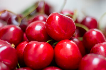Red ripe fresh cherries on farmers market stall.Close up