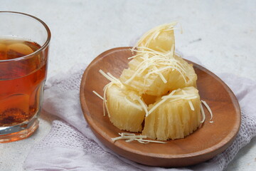 singkong keju -deep Fried cassava sprinkled with grated cheese and sweetened condensed white milk