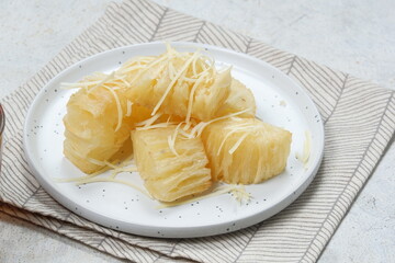singkong keju -deep Fried cassava sprinkled with grated cheese and sweetened condensed white milk