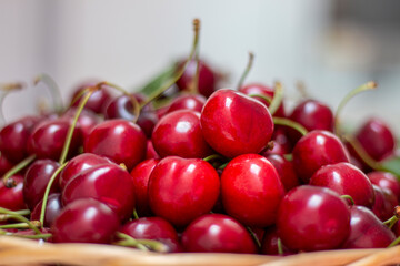 Fresh sweet cherries  in woden basket. Eco production organic fruits - concept. Close up