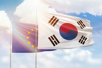 Sunny blue sky and flags of south korea and european union
