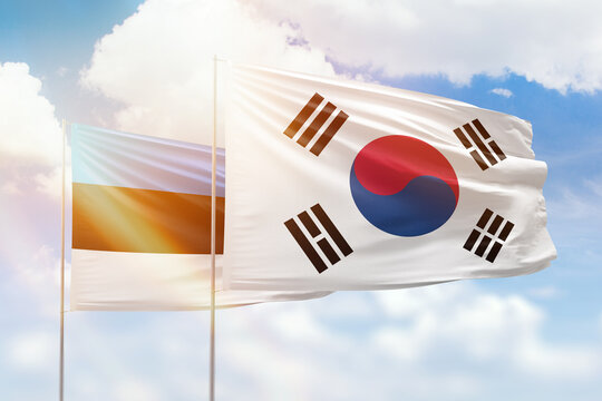 Sunny Blue Sky And Flags Of South Korea And Estonia