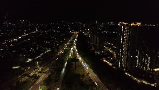 Aerial top down view car traffic light trail move at town in night