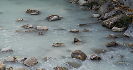 Hot spring river flow over Xinbeitou thermal valley in Taiwan
