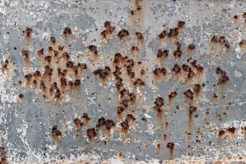 Texture and background of traces of rust on sheet metal.