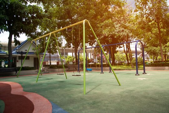 Colorful playground made of plastic empty outdoor playground set playground equipment. play area. Play area. Garden equipment. Children's slide. School yard. Playground in the park..