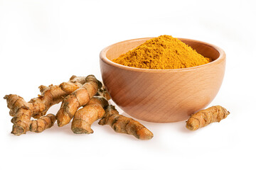 Turmeric powder in bowl with turmeric isolated on white background.