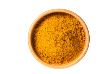 Turmeric powder in wooden bowl isolated on white background. Top view
