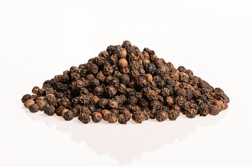 Black pepper on white background