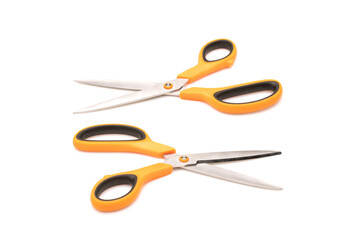 New scissor with orange and black color on handle isolated on white