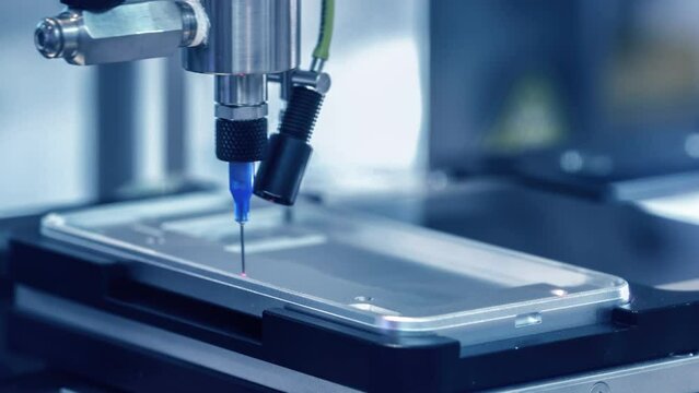 4K: Automated machine in a smartphone assembly line.Seamless loop.