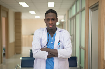 Naklejka na ściany i meble Portraits African American black doctor working in hospital , Afro male doctor in lab