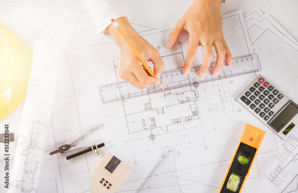 Poster architectural project workspace. top view of architect drawing with ruler on house plan blueprint pa