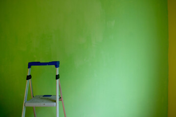 wall and staircase with freshly painted back wall with text space