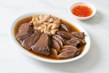 stewed duck offal in brown soup