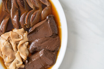 stewed duck offal in brown soup
