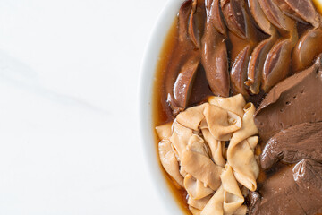 stewed duck offal in brown soup