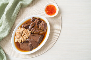 stewed duck offal in brown soup