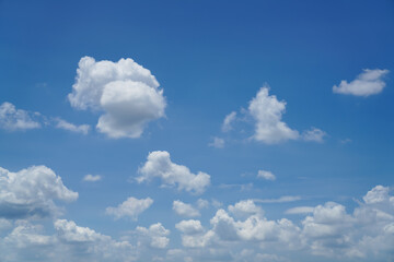 White clouds are floating in the blue sky