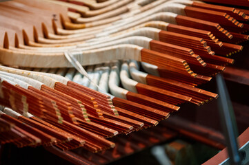Electric motor stator under assembly. Thick copper busbars are wrapped with insulating cloth