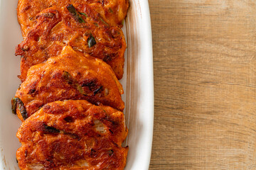 Korean Kimchi pancake or Kimchijeon - Fried Mixed Egg, Kimchi, and Flour