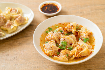 pork wonton soup or pork dumplings soup with roasted chili