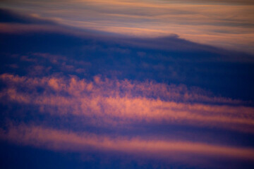 Background with golden and indigo clouds.