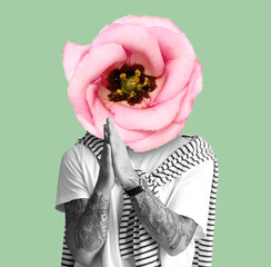 Tattooed man with beautiful flower instead of his head on green background