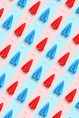 Many umbrellas on colorful background. Pattern for design