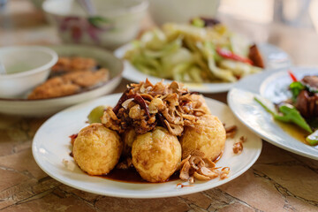 Boiled Eggs and bring to fried seasoned  in the plate for breakfast or lunch or diner